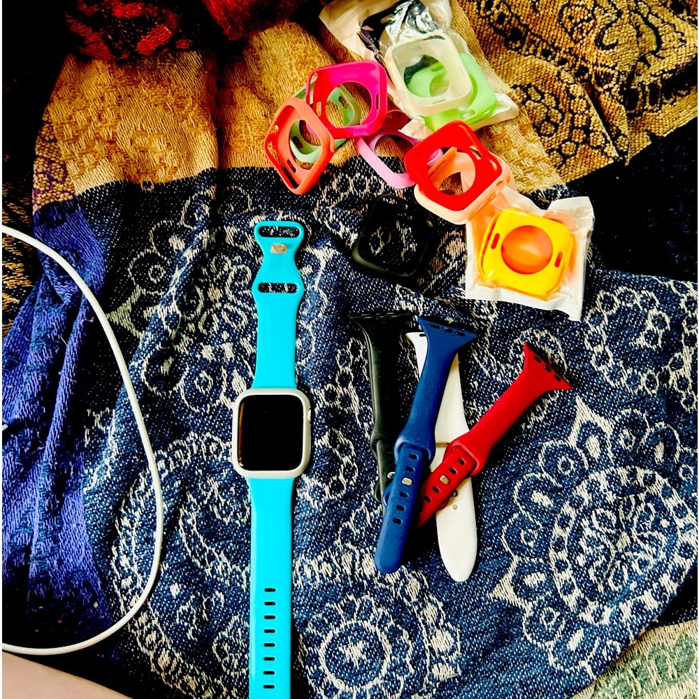 Apple Watch 4 and 5 bands ,charger and 13 silicone cases 44mm. WiFi